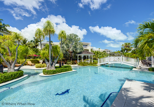 A photograph of the Royal West Indies Resort on Grace Bay Beach, Providenciales (Provo), Turks and Caicos Islands.