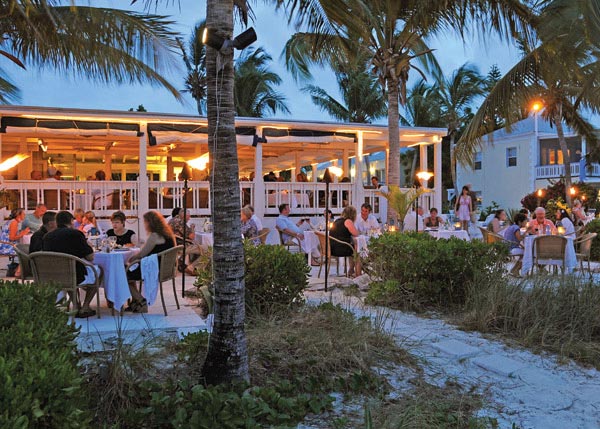 A photograph of the beachfront dining at Bay Bistro on Grace Bay Beach, Providenciales (Provo), Turks and Caicos Islands.